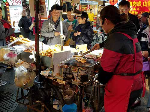 Huaxi Night Market and Snake alley